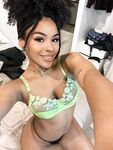 Cute Ebony Girl with an Ass to Die for Sticks Her Tongue Out in the Nude