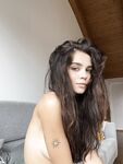 Alluring Brunette an Vavx Poses for a Tease Shoot While in Her Bedroom