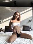Alluring Brunette an Vavx Poses for a Tease Shoot While in Her Bedroom