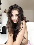 Alluring Brunette an Vavx Poses for a Tease Shoot While in Her Bedroom