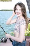 Sweet Teen Elena Koshka Uncovers Her Tiny Breasts While Fishing From Shore