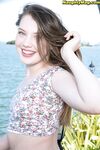 Sweet Teen Elena Koshka Uncovers Her Tiny Breasts While Fishing From Shore