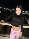 Brunette Teen with a Big Ass Models in a Variety of Outfits and Locations