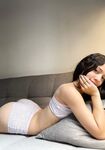 Solo Model with Long Brunette Hair Lauumiau Poses for a Tease Shoot